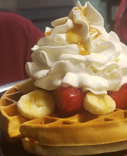 waffles with fruit and whipped cream
