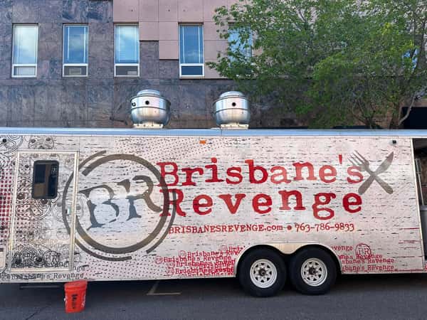 Brisbane's Revenge food truck parked on a city street with bold red lettering and pug face graphics on a weathered white background.