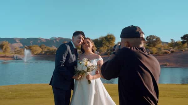Newly wed couple taking pictures on the Desert Willow golf course