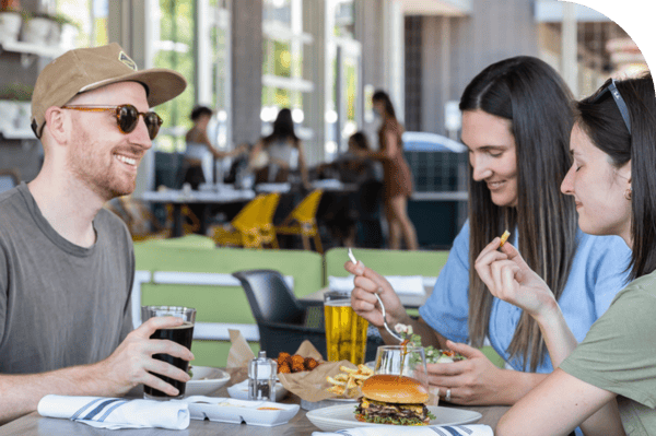 Customers enjoying a meal together