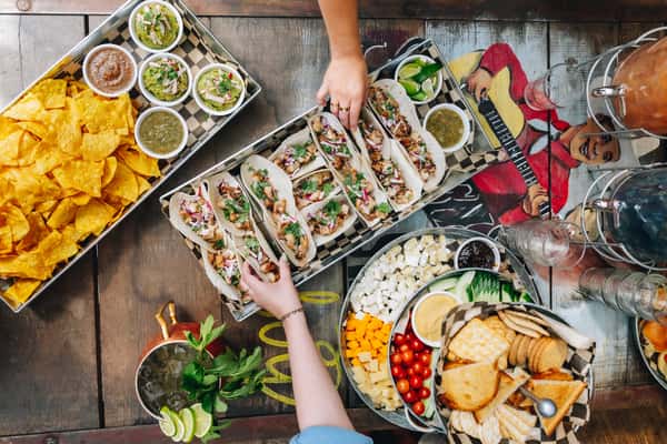 (L-R) Chips & Salsa Tray, Taco Tray, Mega Mule, Charcuterie Platter