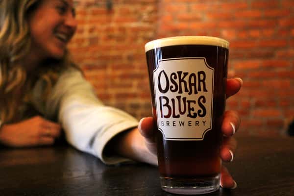 Pint of dark Oskar Blues beer