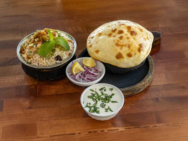 124. Awadhi Dum Biriyani ( J ) ( S ) ( G ) ( V )