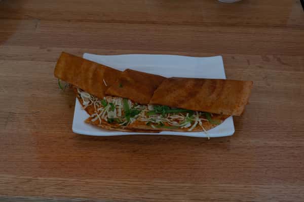 84. Schezwan Dosa (G) (V)