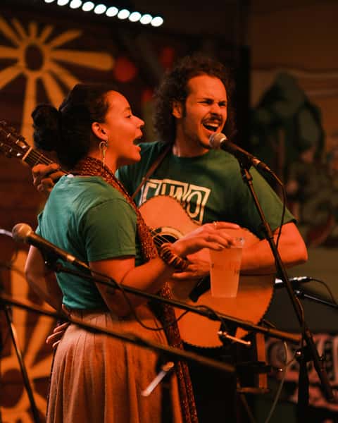 man and woman performing