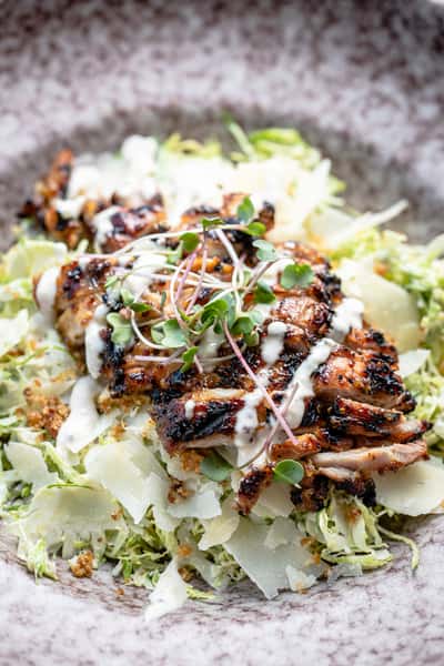 Grilled Chicken Shaved Brussel Sprout Caesar