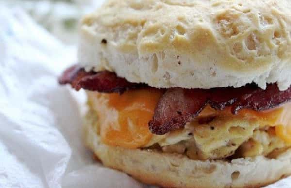 Bacon, Ham, or Scrapple Egg & Cheese On a Roll or Biscuit