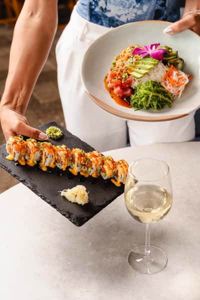 Crazy Salmon Sushi Roll and a Poke Bowl