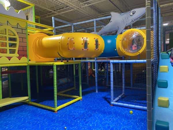 Play structure tunnels