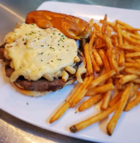 Mac n Cheese burger with a side of French fries