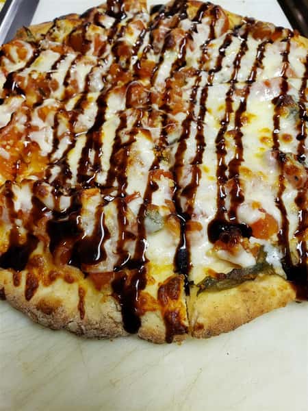 cauliflower crust pizza wuth cheese and bbq sauce