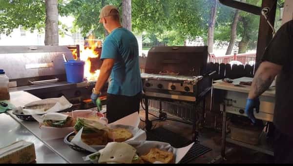 Joe cooking ouside all year