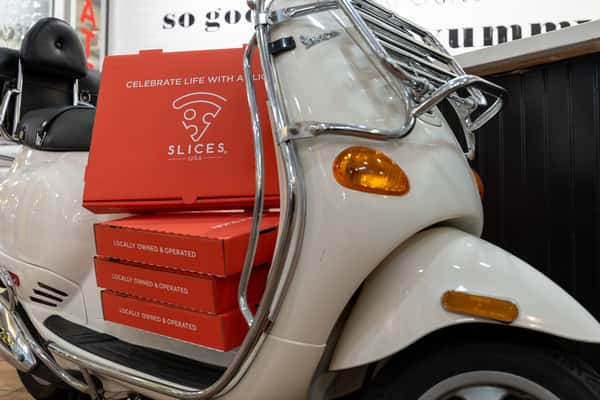 Slices Moped with To-Go boxes