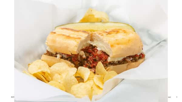 Stromboli comes w/ Chips & Pickle Spear