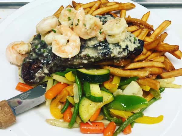 surf n turf includes a 12 oz. NY Strip Steak with Shrimp sauteed in a savory shrimp scampi sauce