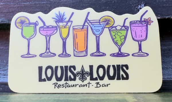 A sticker featuring various colorful cocktails with the text "LOUIS LOUIS Restaurant. Bar" beneath.