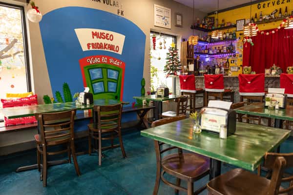 Interior of restaurant with decorated wall paintings
