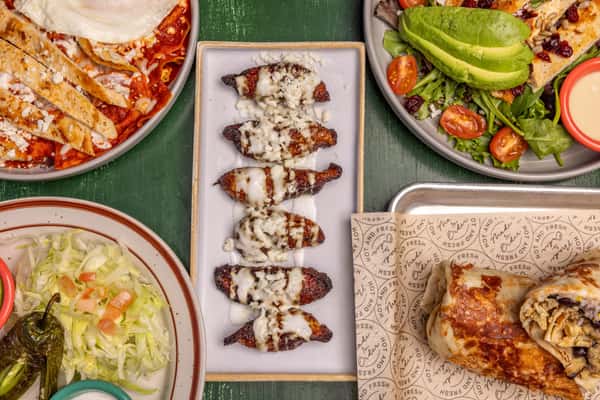 Table spread of different mexican foods