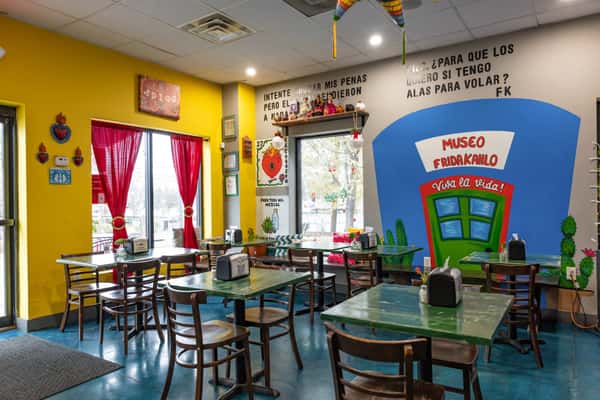 Interior of restaurant with tables and seating