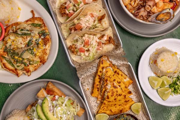 Table spread of different mexican foods