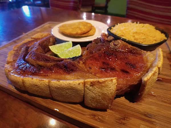 Crispy Chicharron with Tostones y Arroz Amarillo