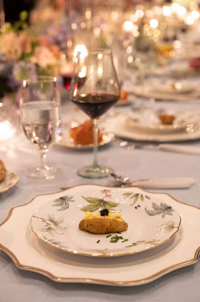 table set with fine china for catered event
