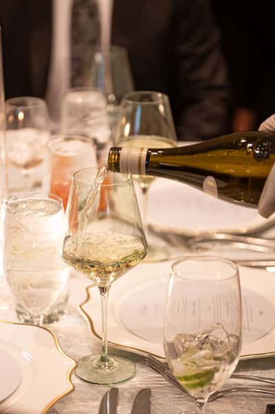 Server pouring drinks