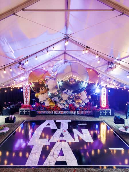 Decorated event venue with balloons and flowers