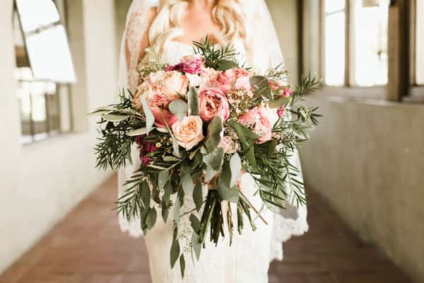 Bride holding a floral bouquet