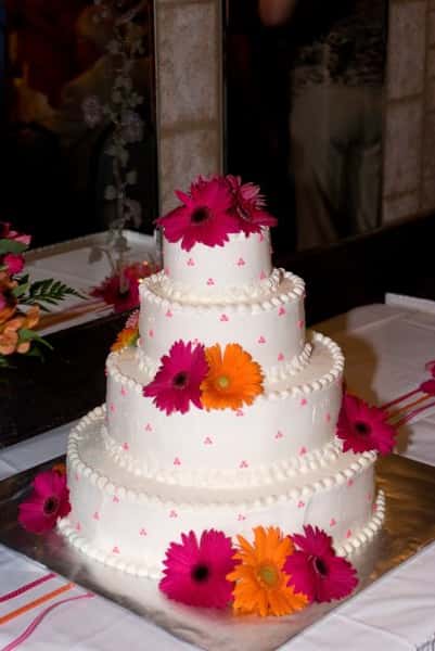 wedding cake on table with floral decor