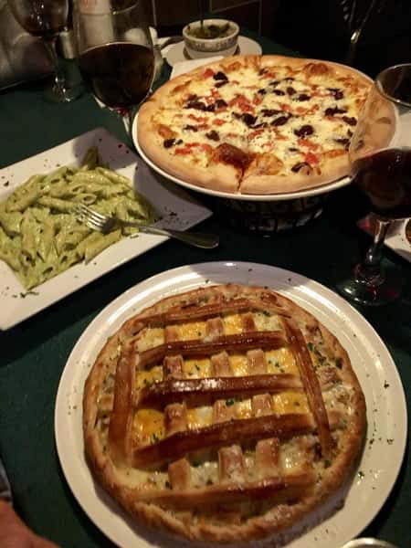 assorted pizzas and pastas