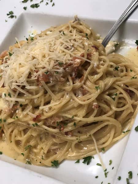 Shrimp Scampi: Shrimp in a Lemon Butter Garlic White Wine Sauce over Linguini
