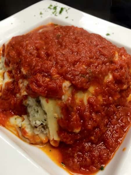 Lasagna: A Tradition of Pasta, Meat, Ricotta Cheese, Mozzarella Cheese, Tomato Sauce