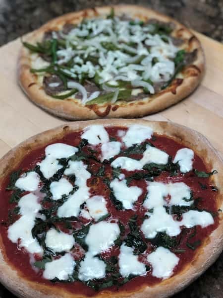 margarita pizza and philly cheesesteak pizza