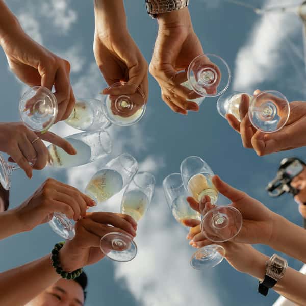 Group cheers with cocktails