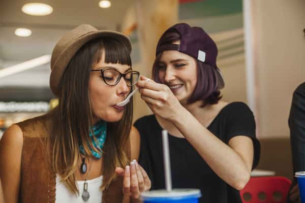 two women eating ice cream