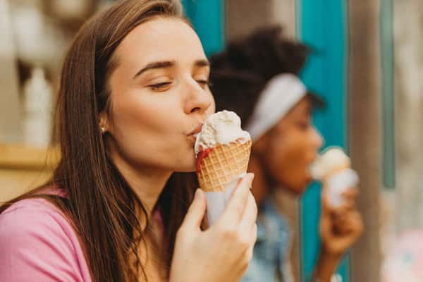 two girls eating an ice cream