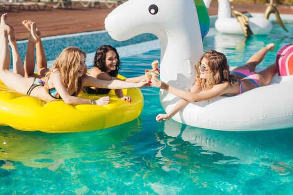 People on floaties with ice cream