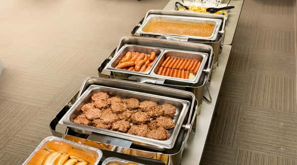 Catering buffet line with hot dishes served by A Taste of Country Catering in Sioux Falls
