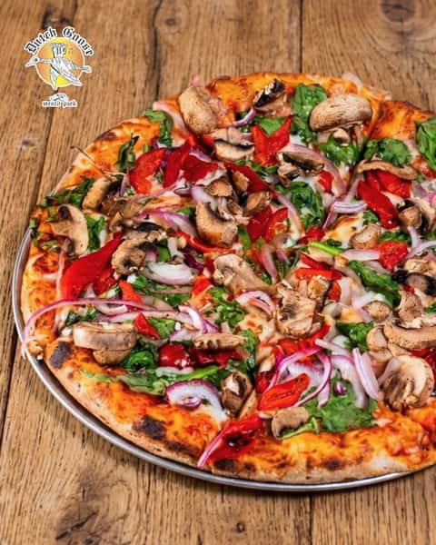 Pizza with a fresh side of personality.

Homemade dough, tomato sauce, melty mozzarella, spinach, mushrooms, roasted red peppers, and red onion make every slice colorful from edge to edge.

Pick your table, grab a pizza, and enjoy a slice at Dutch Goose! Link in bio to book.

#DutchGoose #MenloPark #MenloParkEats #BayAreaFoodie #SiliconValleyEats #PeninsulaFood #SupportLocal #Since1966 #GooseIsLoose #BurgersAndBrews