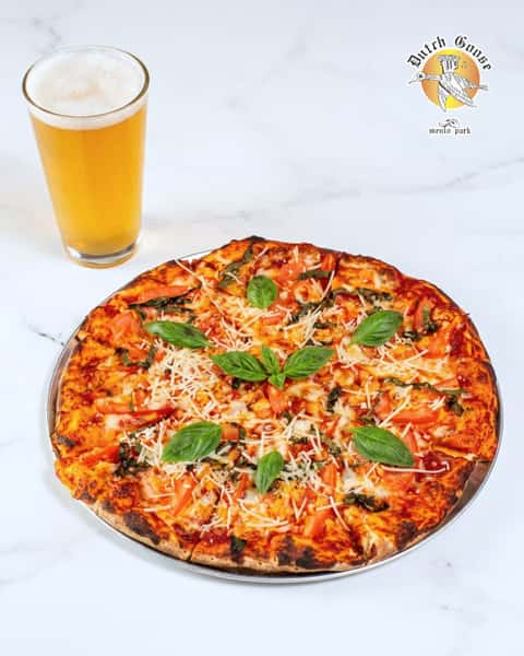 Our Margherita Pizza brings homemade dough, fresh basil, garlic, mozzarella, tomato slices, and olive oil together for a classic bite.
Pair it with a cold beer and call it a very good decision.
Grab a slice, grab a beer, and make it a Dutch Goose night.
#DutchGoose #MenloPark #MenloParkEats #BayAreaFoodie #SiliconValleyEats #PeninsulaFood #SupportLocal #Since1966 #GooseIsLoose #BurgersAndBrews