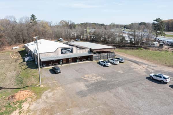 Aerial angle of Blackwell Revival with parking and outdoor space in Atkins, AR