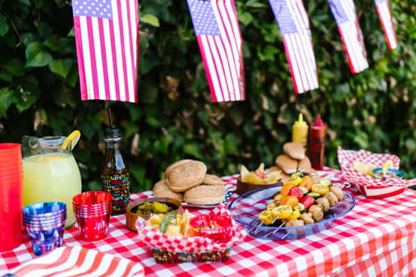 picnic table with flags flying