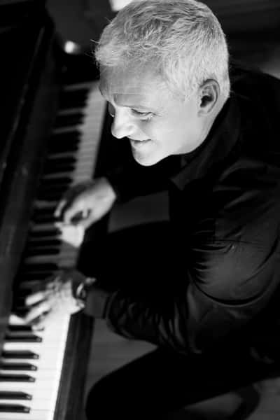 D.S. WIlson playing piano