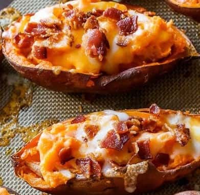 Potato Skins filled with cheese and bacon served with sour cream