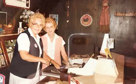 ladies behind counter
