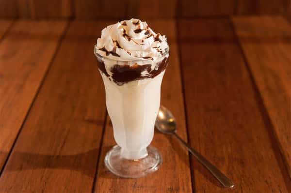 vanilla milkshake topped with whipped cream