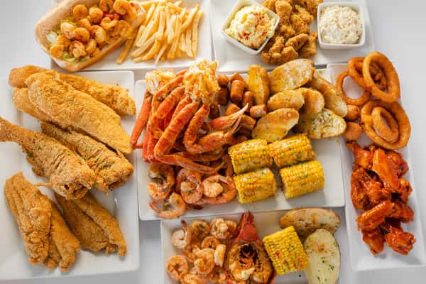 Hero image of multiple seafood dishes