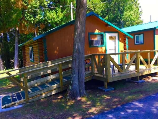 outdoor view of a cabin with a ramp