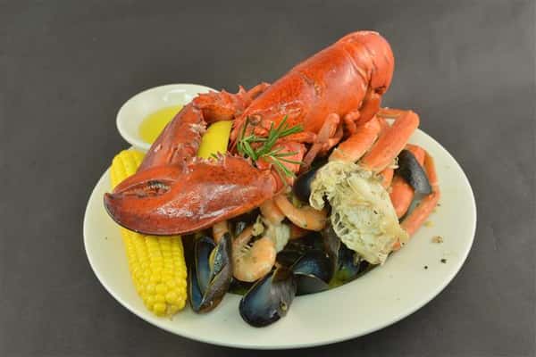 Lobster Topped on shrimp and mussels